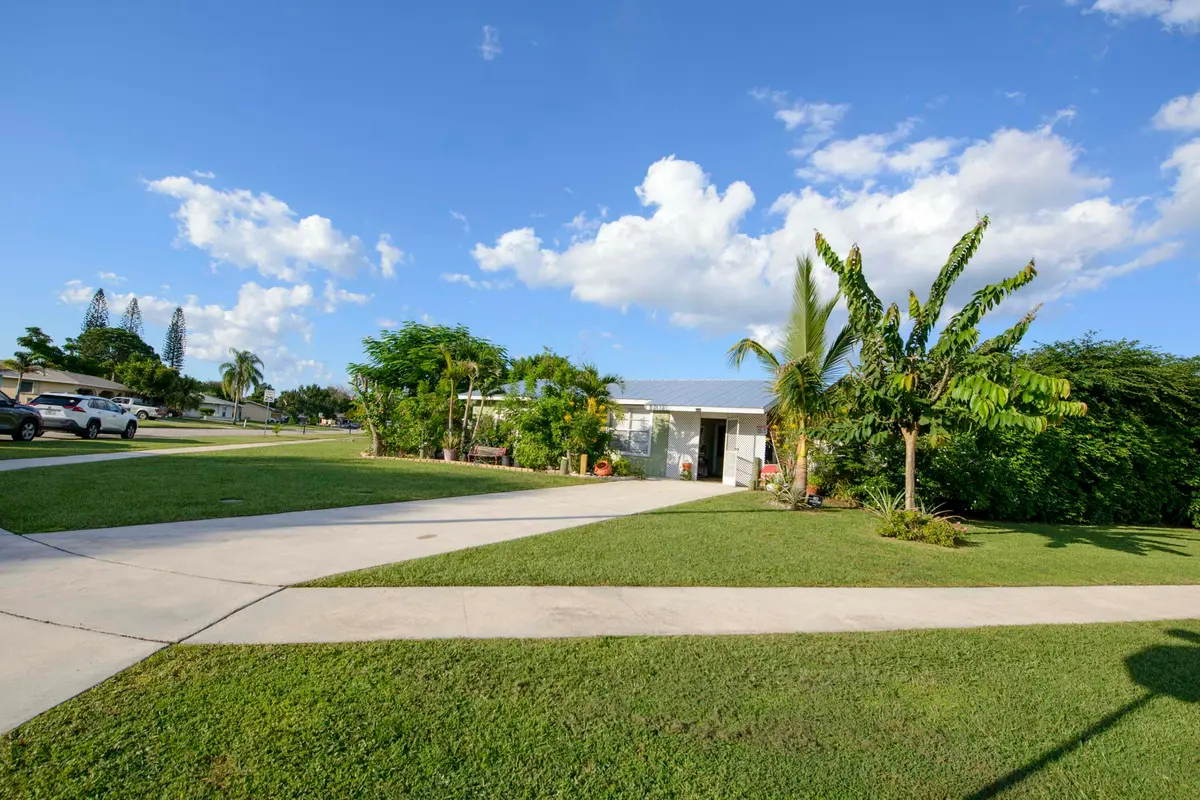 01- Front (3) at 221 SW CALMOSO Drive, Port St. Lucie