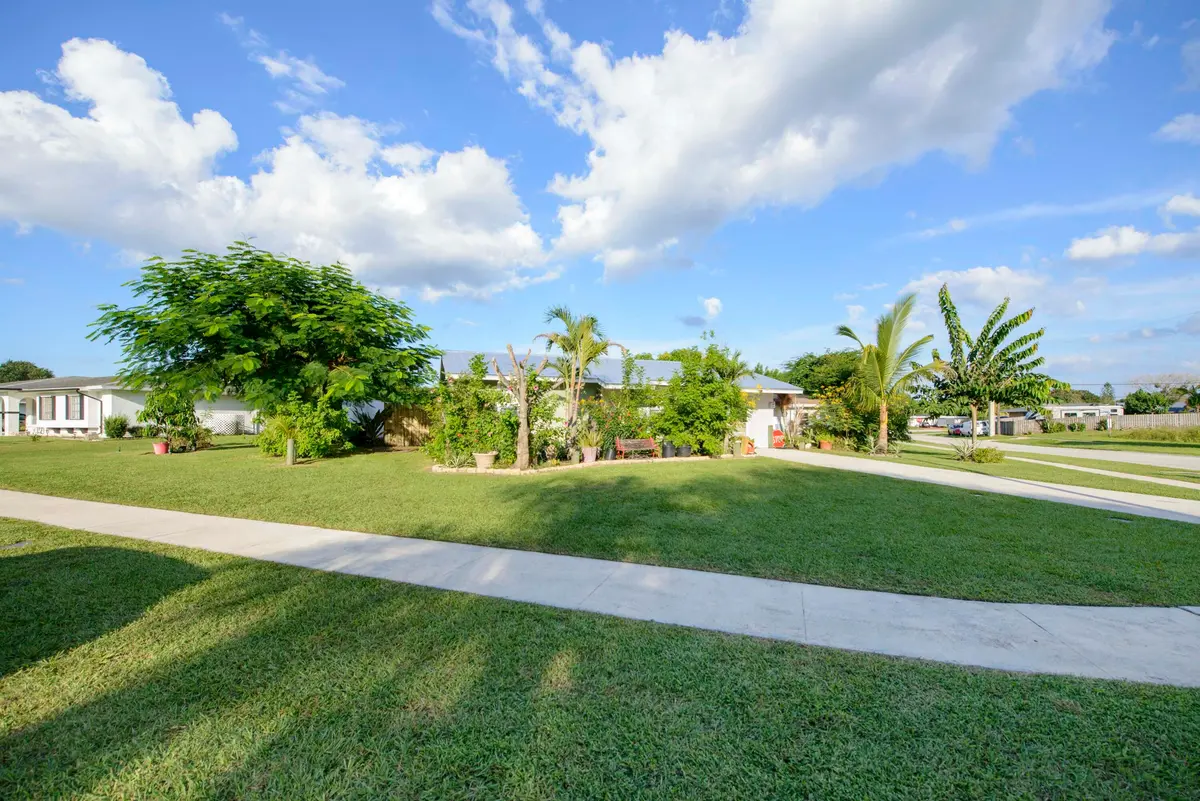 01- Front (4) at 221 SW CALMOSO Drive, Port St. Lucie