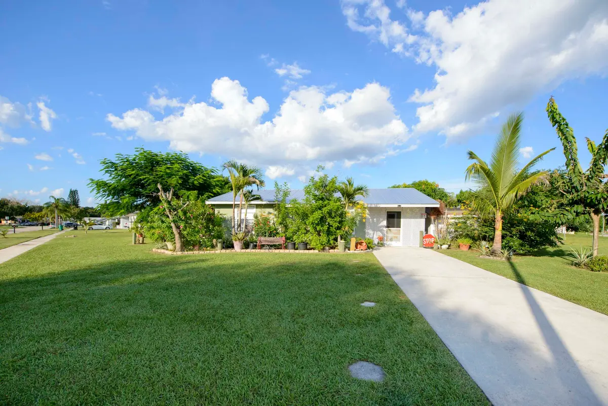 01- Front (5) at 221 SW CALMOSO Drive, Port St. Lucie