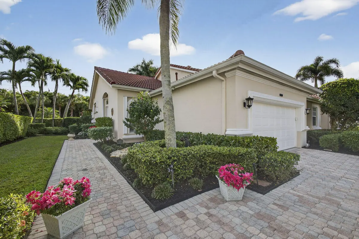 Front and side of home at 8184 Sandpiper Way, West Palm Beach