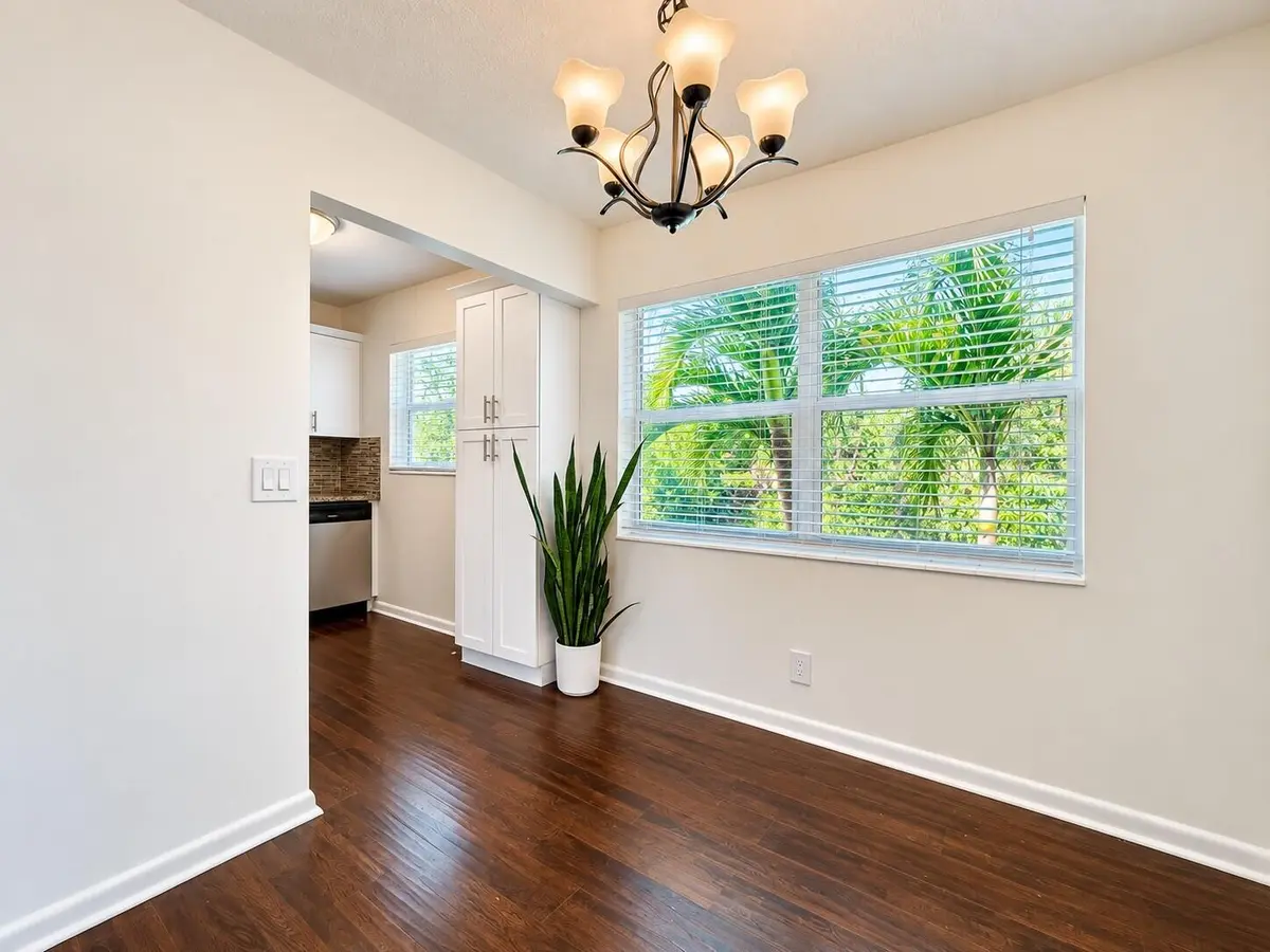 Dining to Kitchen at 200 Northampton J, West Palm Beach