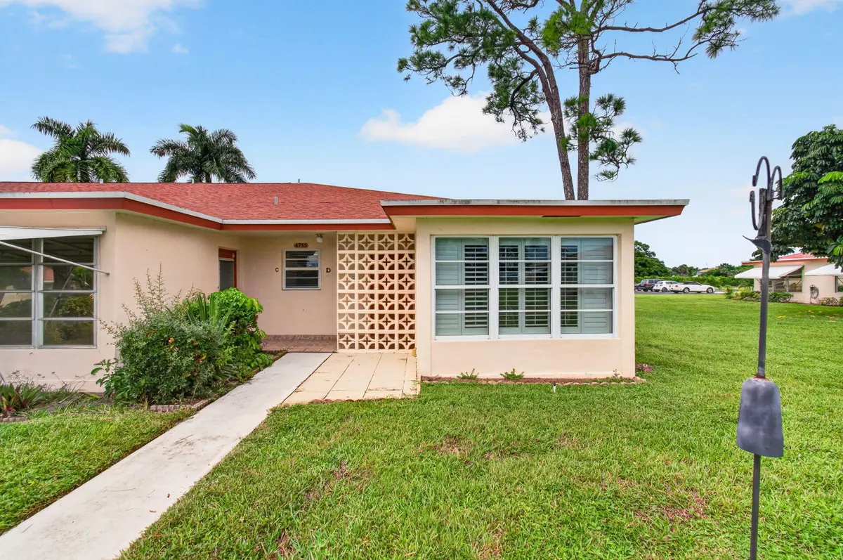 Front view of corner villa (5) at 4755 NW 3RD Court D, Delray Beach