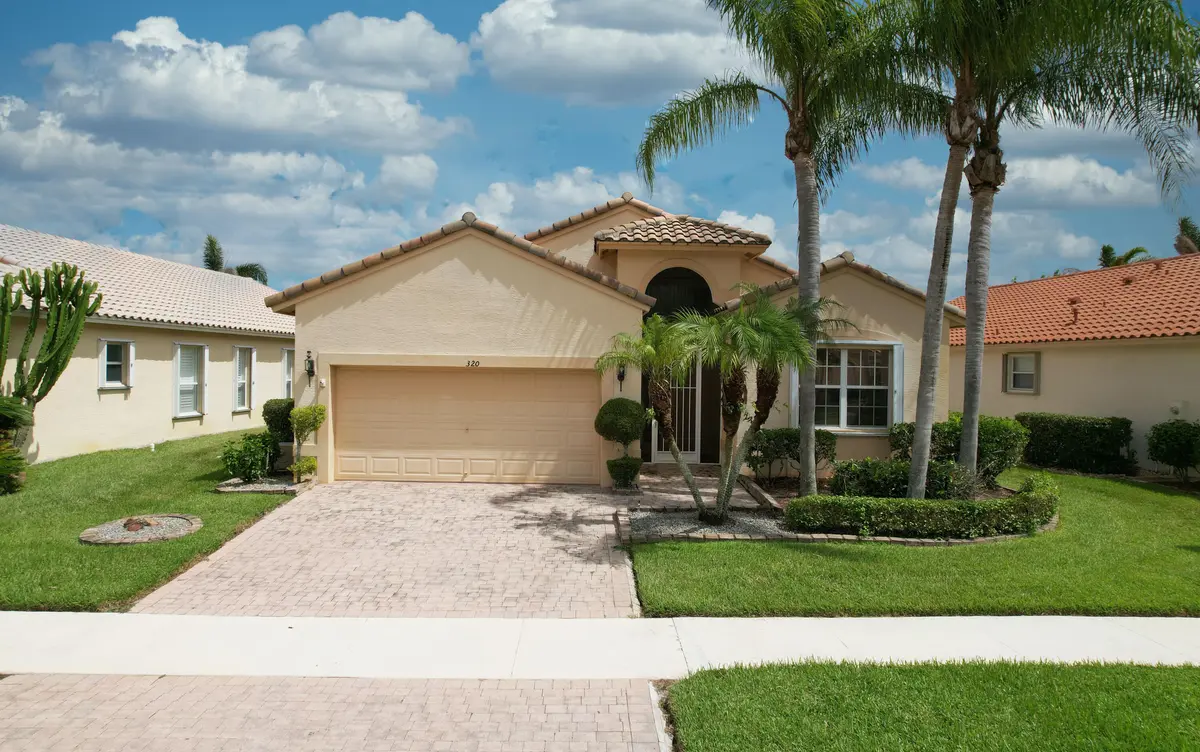 Front Exterior at 320 NW MILLPOND Lane, Port St. Lucie