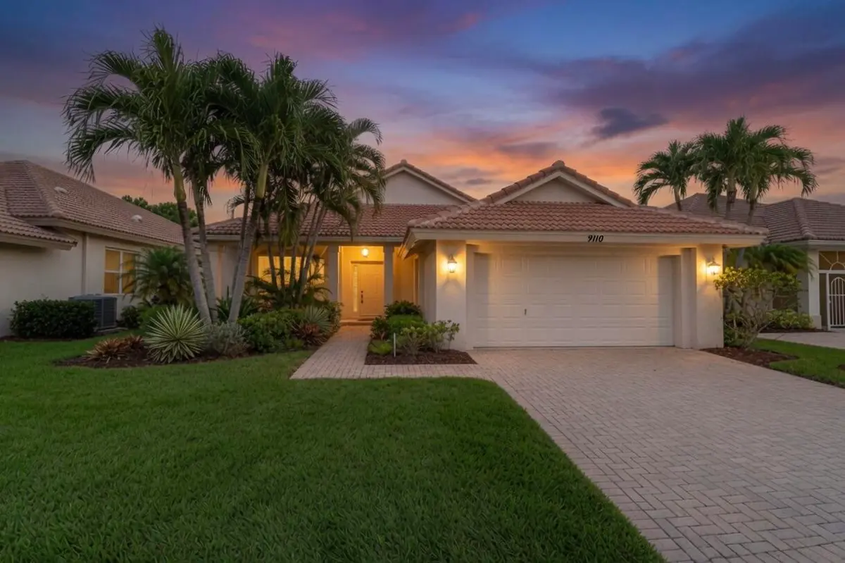 Front Exterior Twilight at 9110 Bay Harbour Circle, West Palm Beach