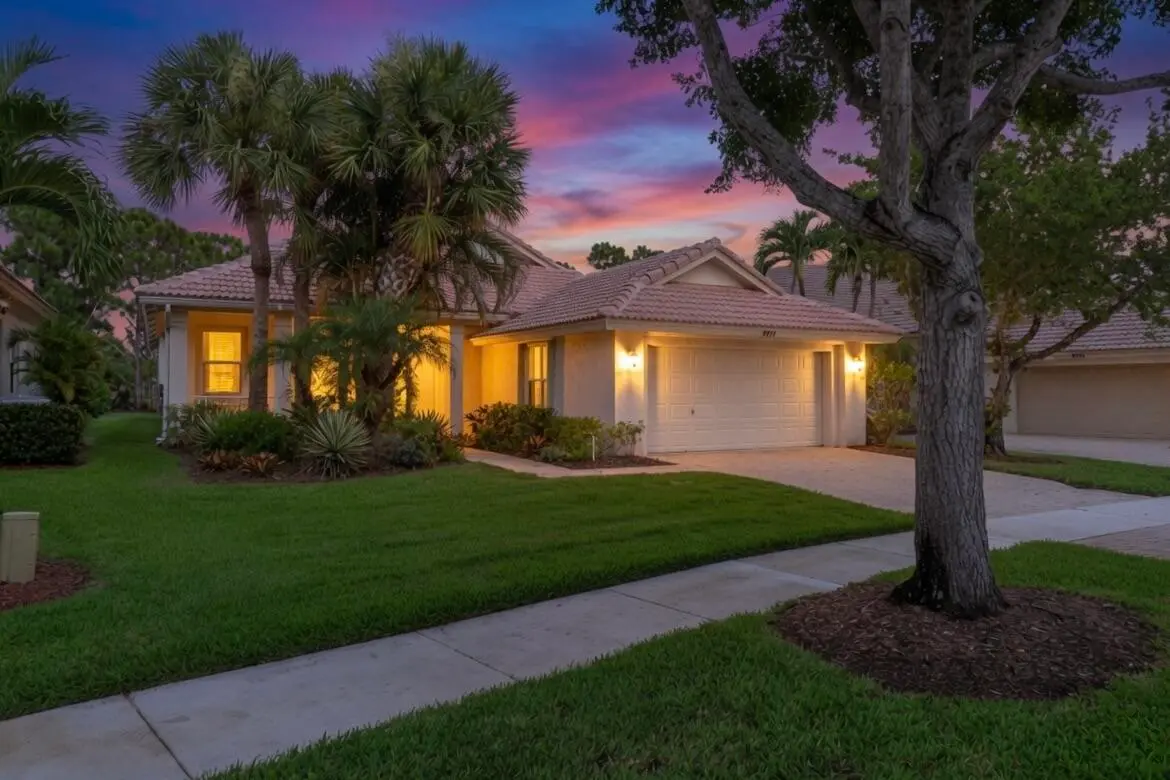 Front left Twilight at 9110 Bay Harbour Circle, West Palm Beach