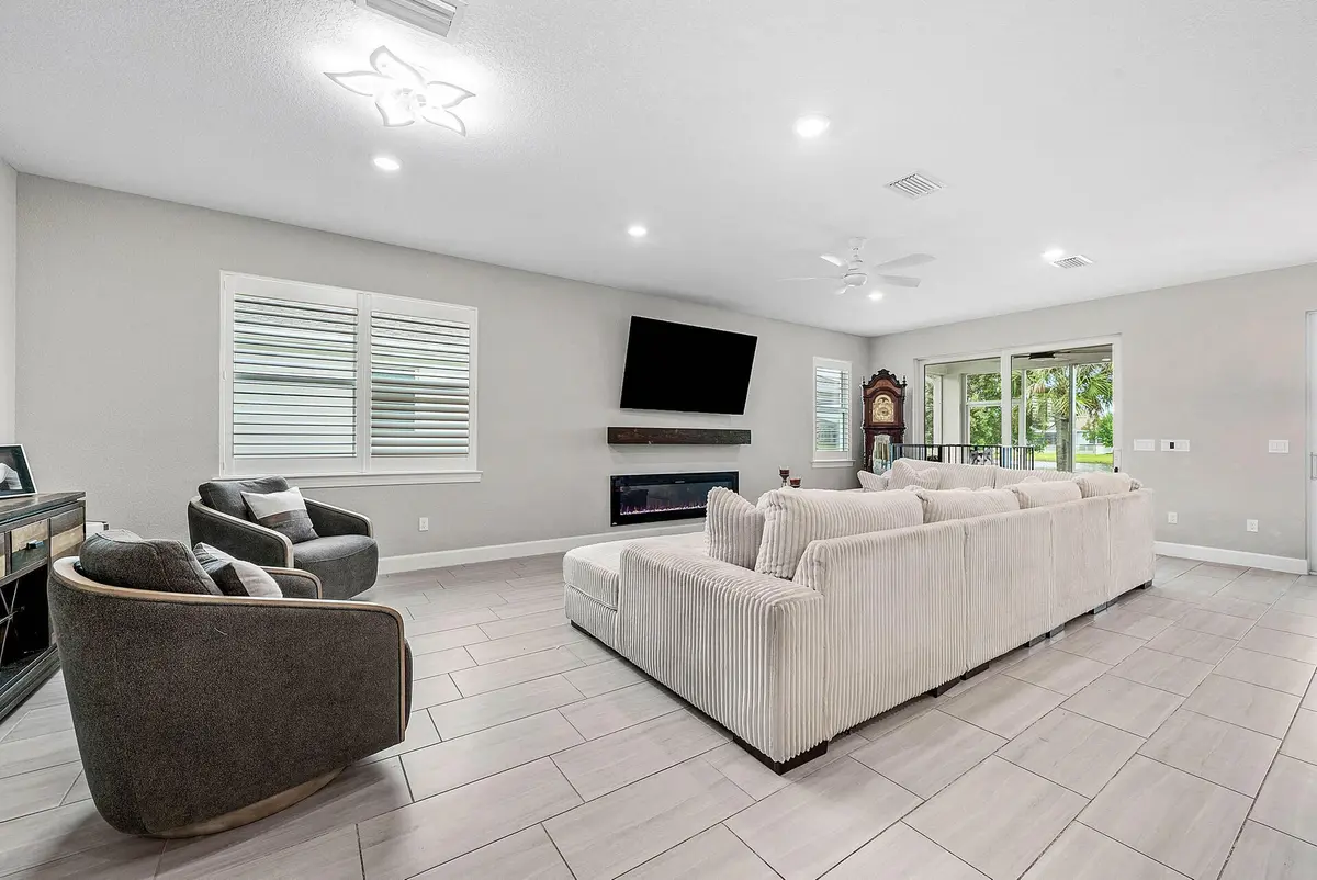 living at 13802 SW Gingerline Drive, Port St. Lucie