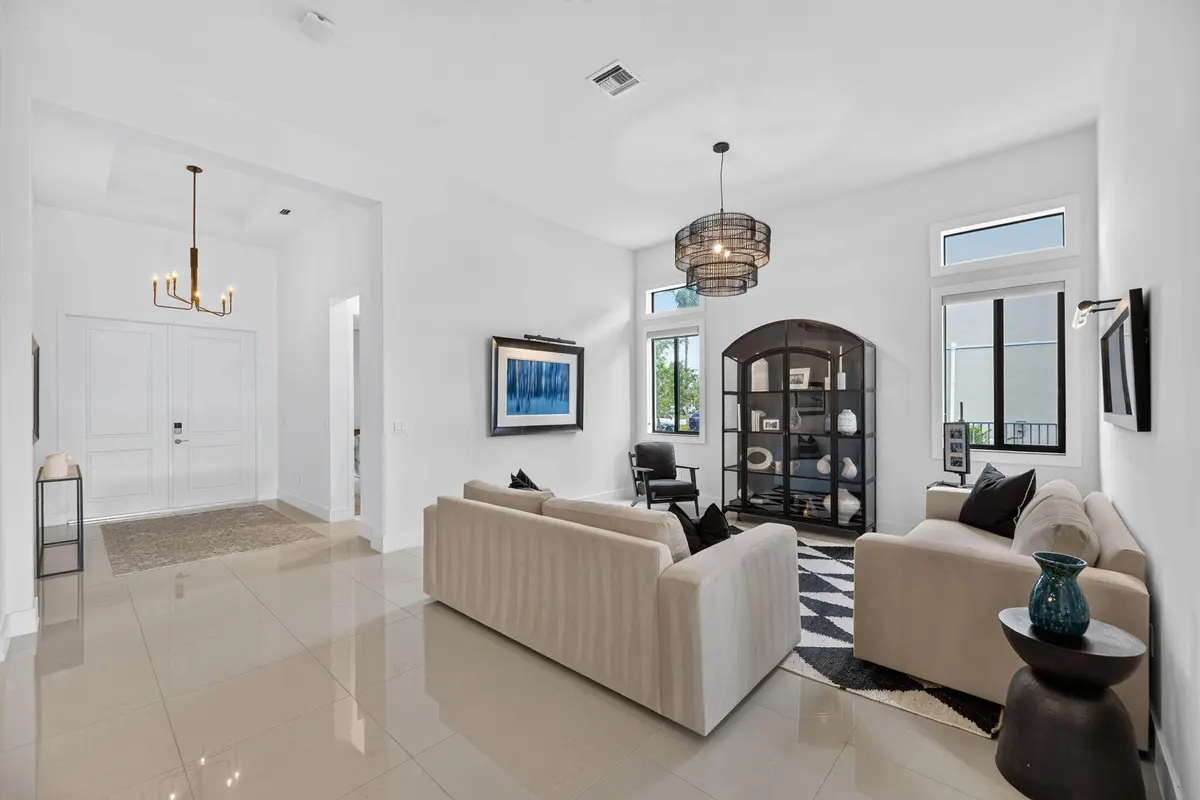 66-web-or-mls-Living room 2 at 10490 S Lago Vista Circle, Parkland
