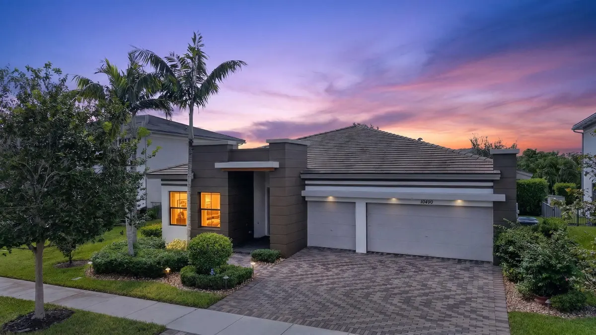 8-web-or-mls-Aerial Twilight Front at 10490 S Lago Vista Circle, Parkland