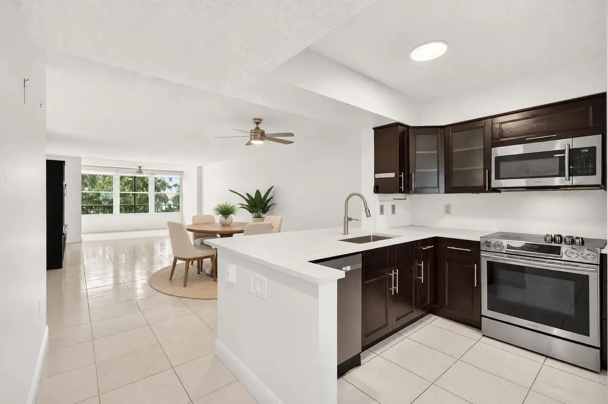 03_Open_Kitchen_Staged at 6065 Pointe Regal Circle 403, Delray Beach