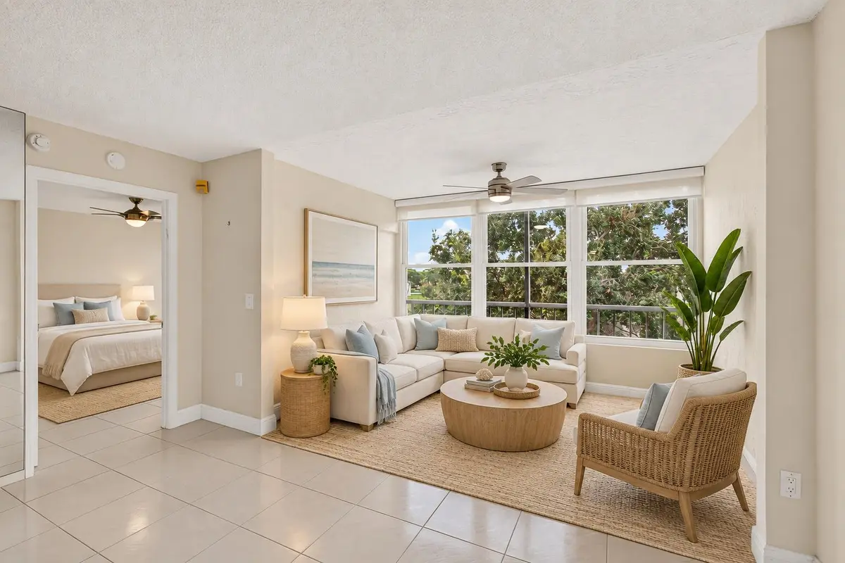 06_Living_Room_Staged_Alternate at 6065 Pointe Regal Circle 403, Delray Beach