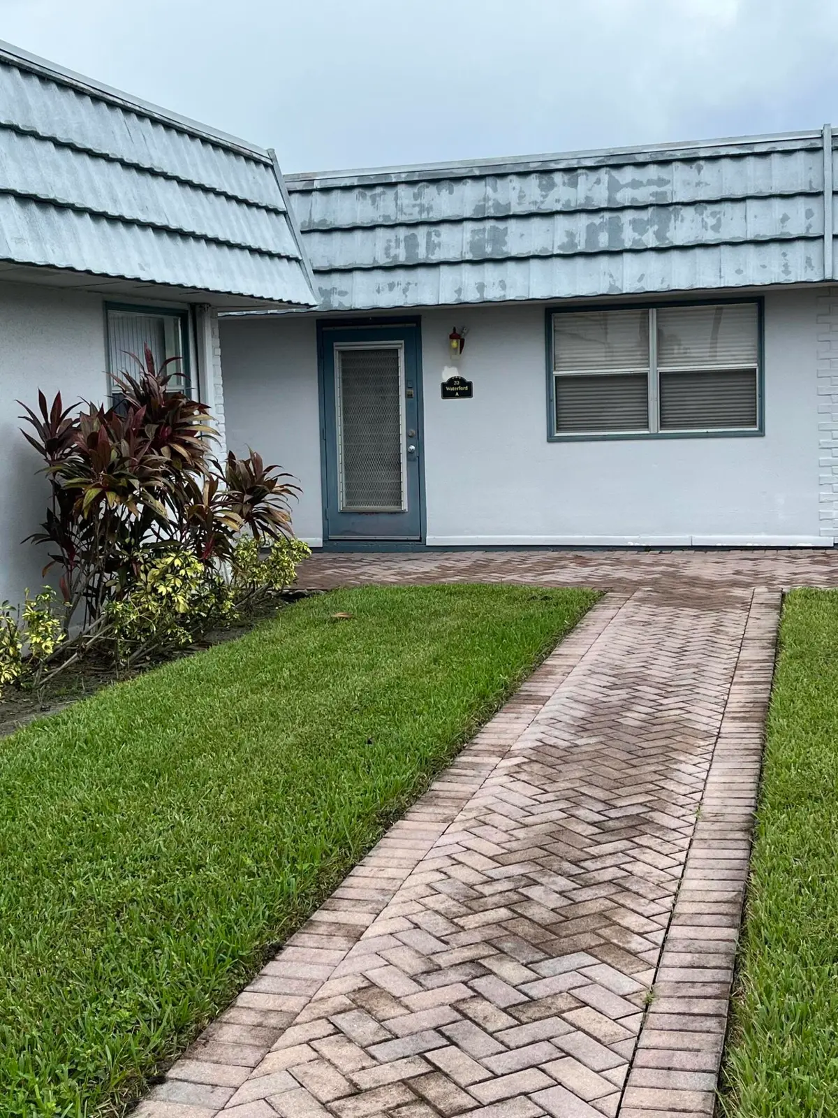 path to front door at 20 Waterford A, Delray Beach