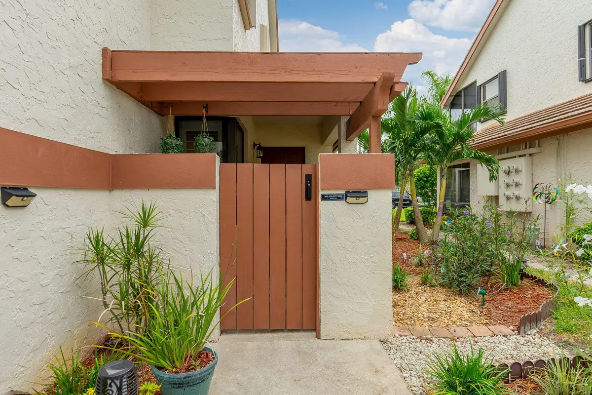 Front Patio Entry at 12660 Shoreline Drive 1C, Wellington