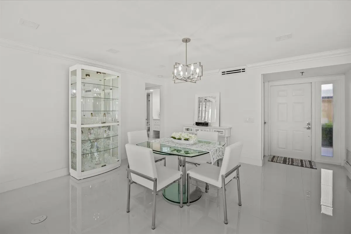 Towards Front Door at 5390 WOODLAND LAKES Drive 105, Palm Beach Gardens