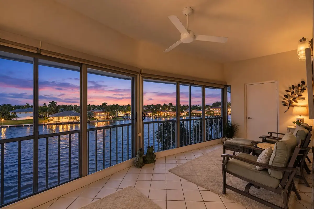 Cozy Waterfront Sunroom at Blue Hour at 711 N RIVERSIDE Drive 401, Pompano Beach