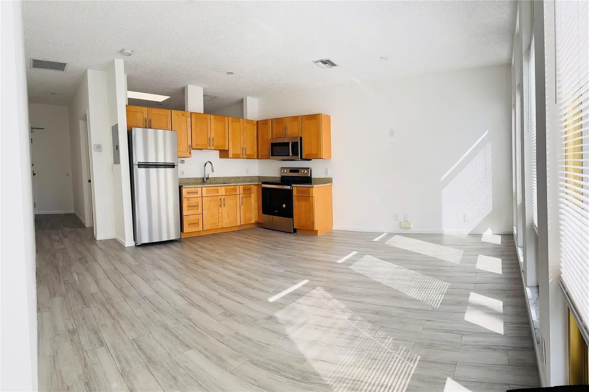 Open concept at 229 COMMERCIAL Boulevard 1, Lauderdale-By-The-Sea
