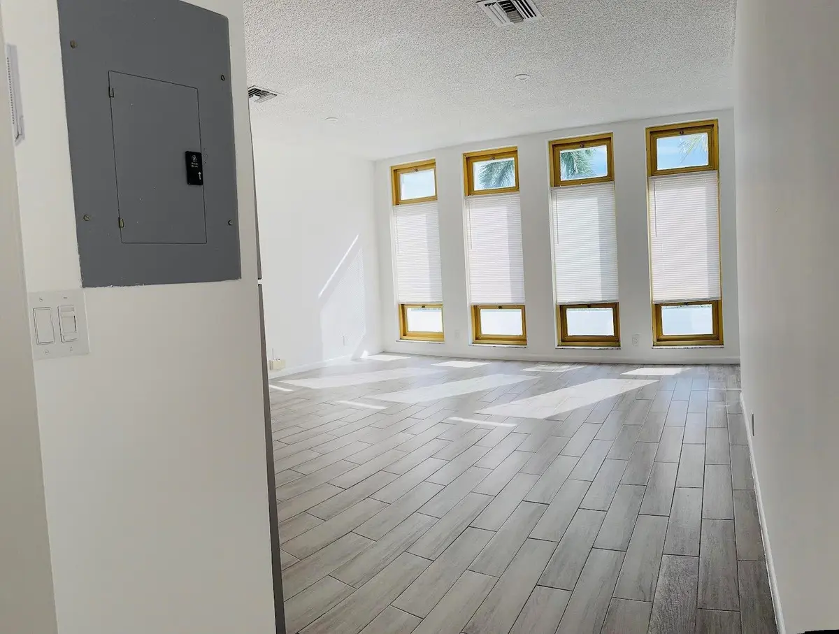 Living room-Dinng area at 229 COMMERCIAL Boulevard 1, Lauderdale-By-The-Sea