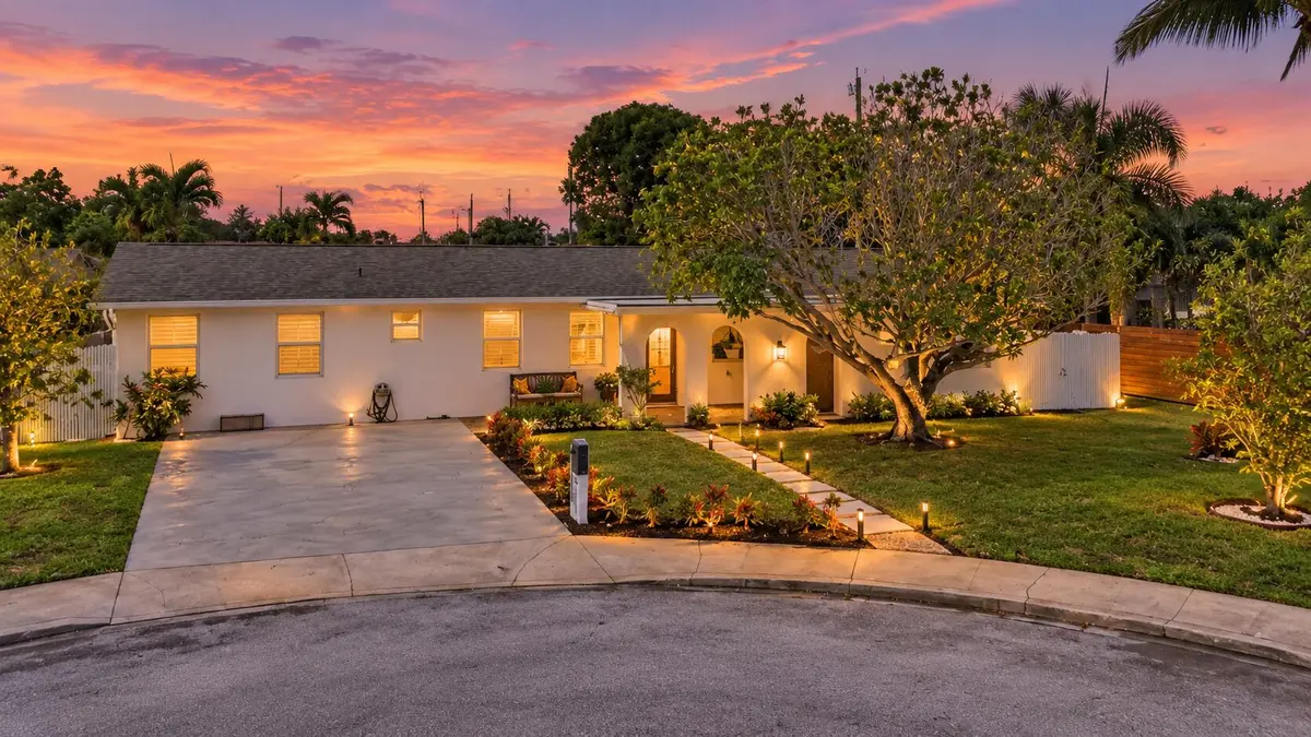 Twilight Tropical Curb Appeal at 1409 Richard Lane, Lake Worth Beach