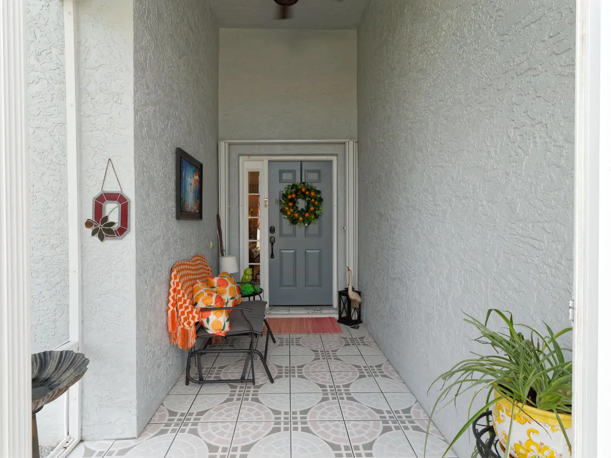 P1195068_DxO at 908 NW Sarria Court, Port St. Lucie