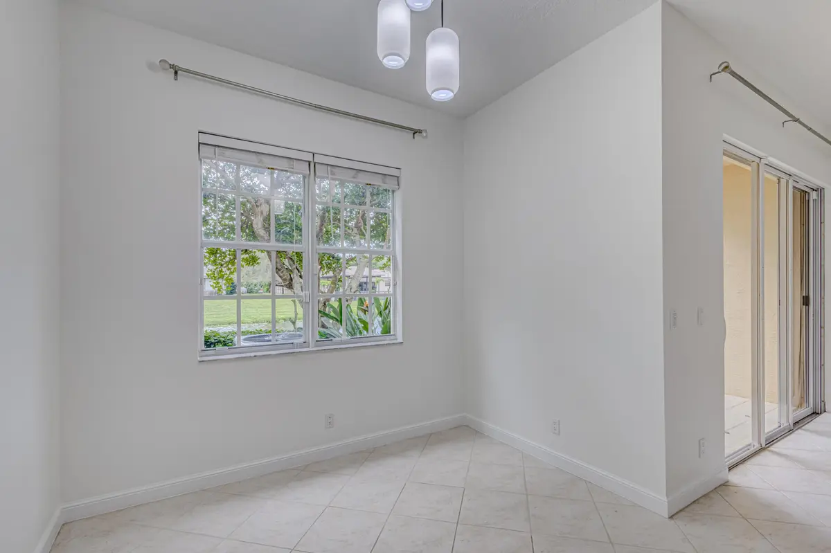 Dining room at 402 Commons Way, Palm Beach Gardens