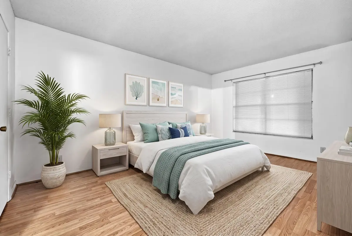 Primary Bedroom Virtually Staged at 8501 BLUE CYPRESS Drive, Lake Worth