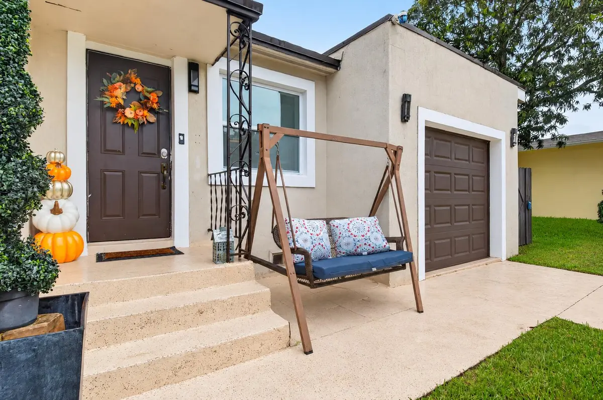 Clean Suburban Entryway and Garage at 1019 N C Street, Lake Worth Beach