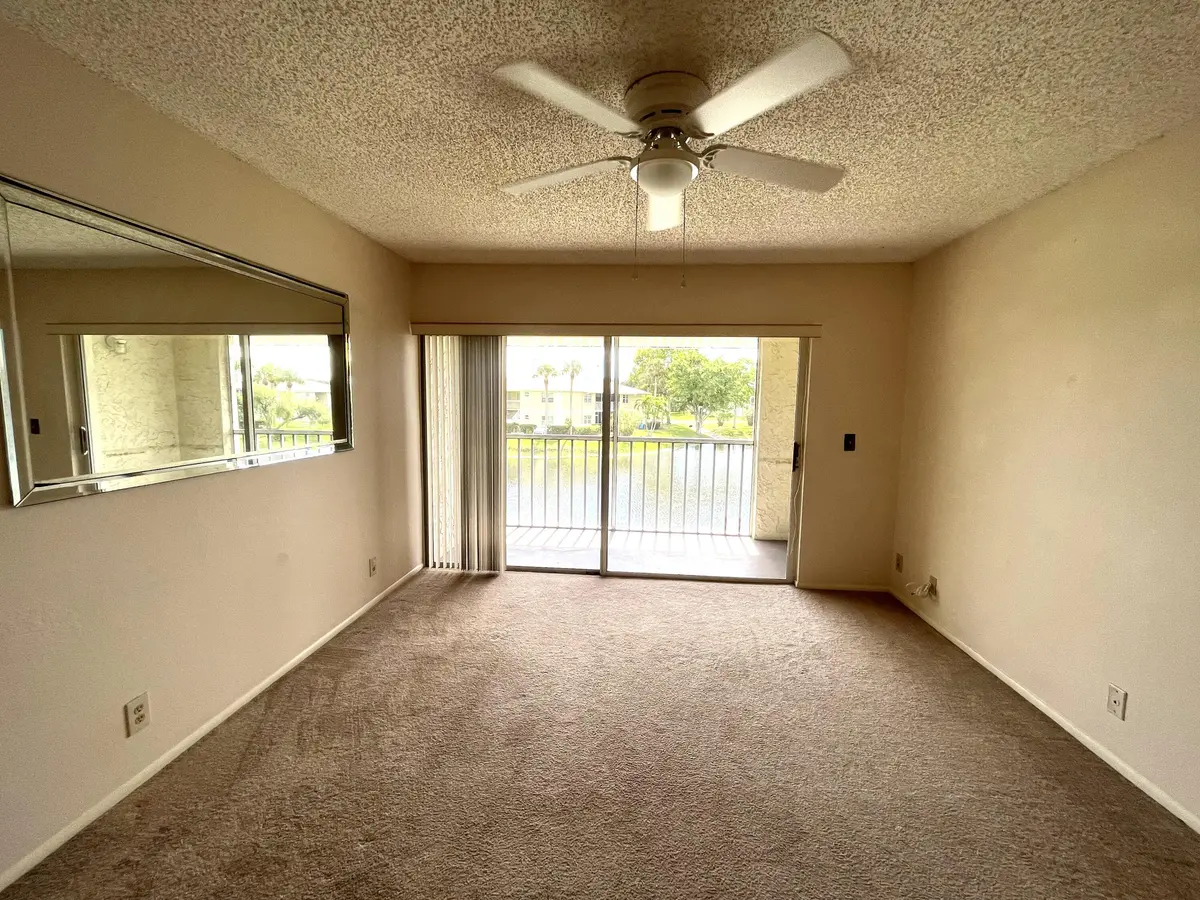 Living Room at 1531 SE Royal Green Circle R-206, Port St. Lucie