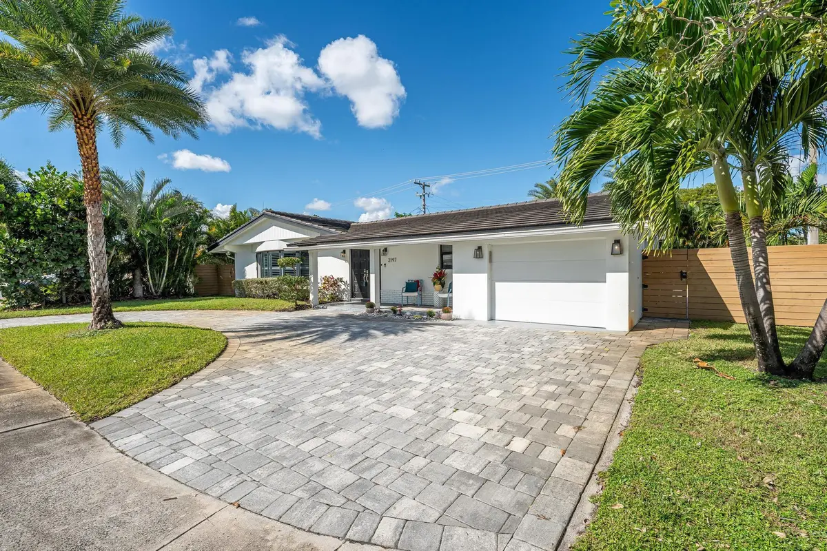 Front of home with one-car garage at 2197 NE 61st Court, Fort Lauderdale