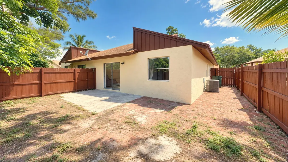 Sunny_Empty_Open-Plan_Florida_Interior at 3770 MIL LAKE Court, Greenacres