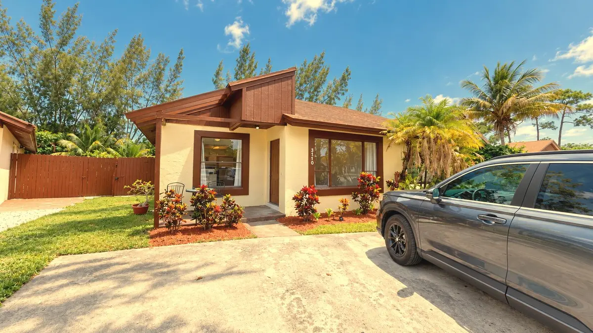 Sunny_Tropical_Backyard_Patio at 3770 MIL LAKE Court, Greenacres