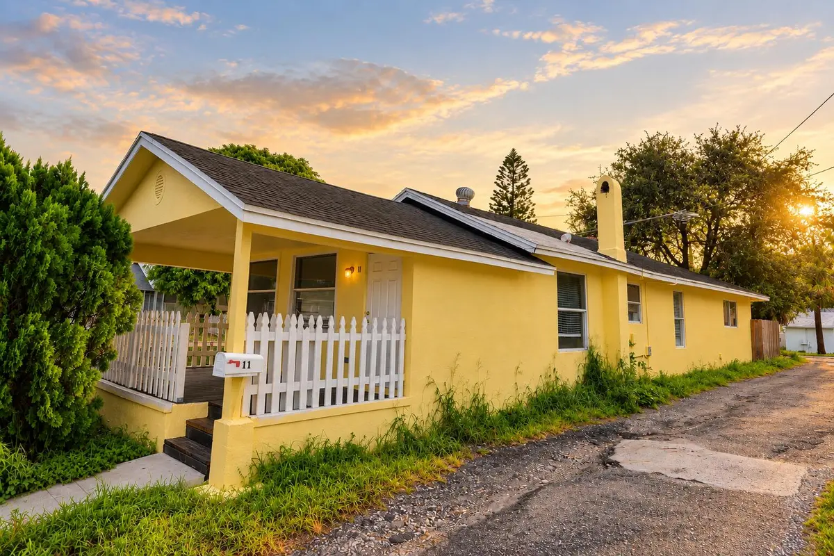 Golden-Hour Yellow House Exterior at 11 S D Street, Lake Worth Beach