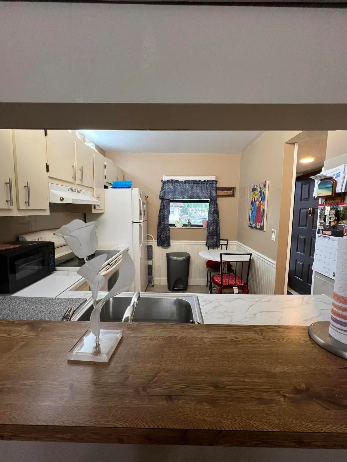 KITCHEN PASSTHROUGH at 7245 Golf Colony Court 203, Lake Worth