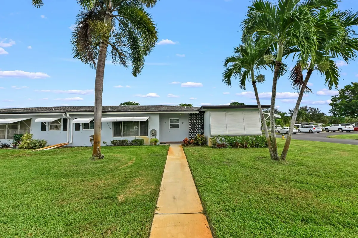 01 Front Exterior at 665 High Point Drive C, Delray Beach