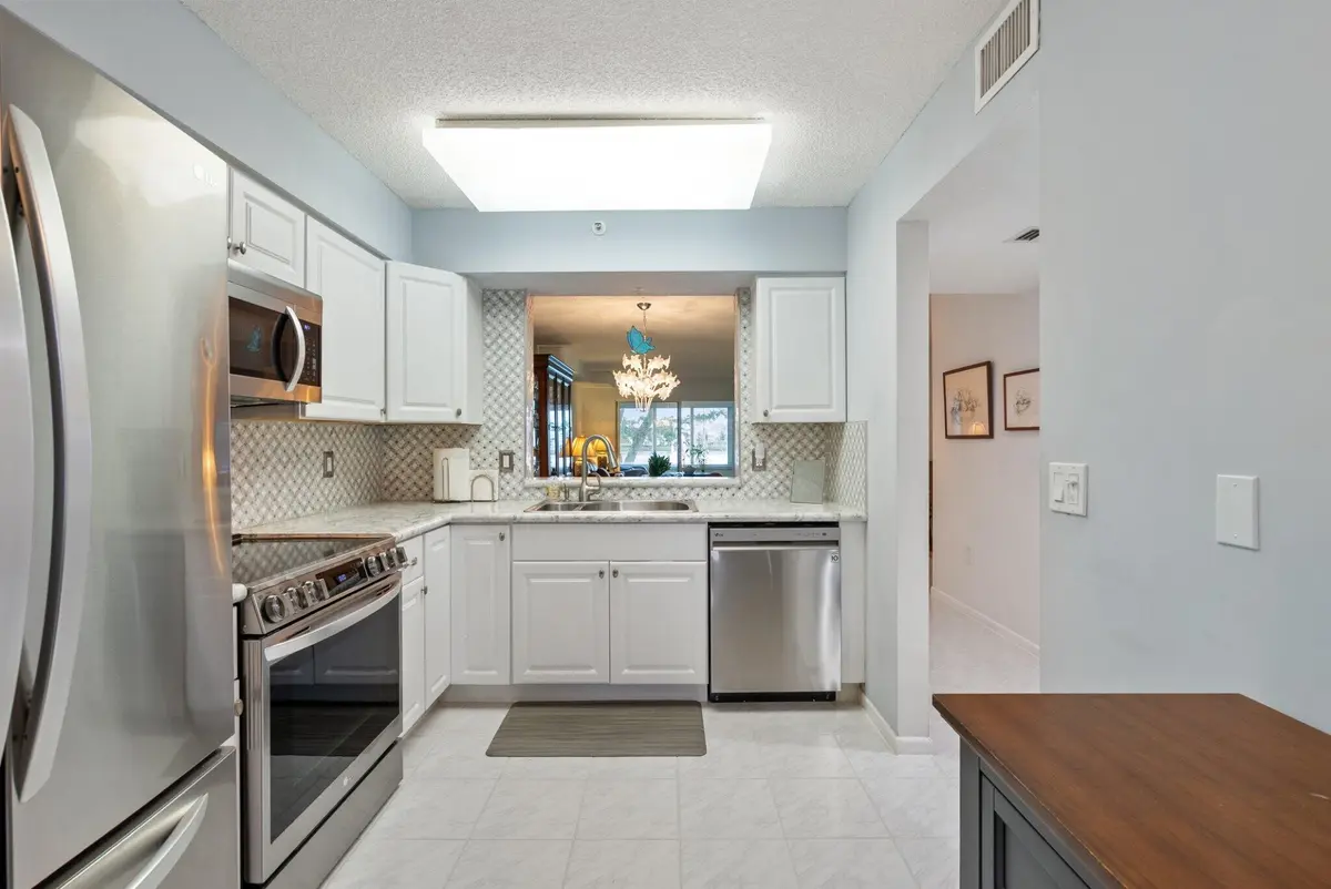 Updated Kitchen at 6096 HUNTWICK Terrace 206, Delray Beach