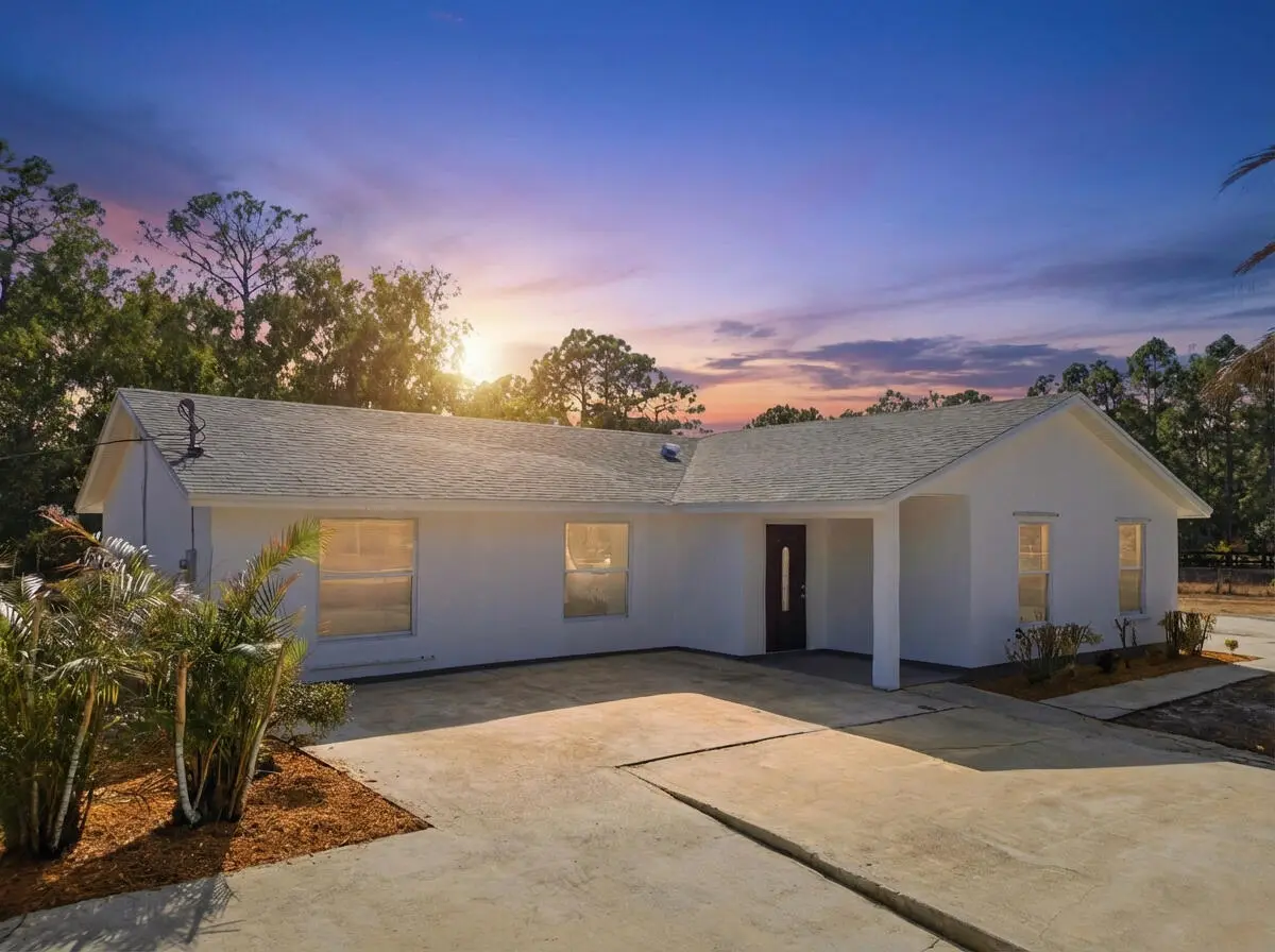 Front Dusk at 14242 77TH Place, The Acreage