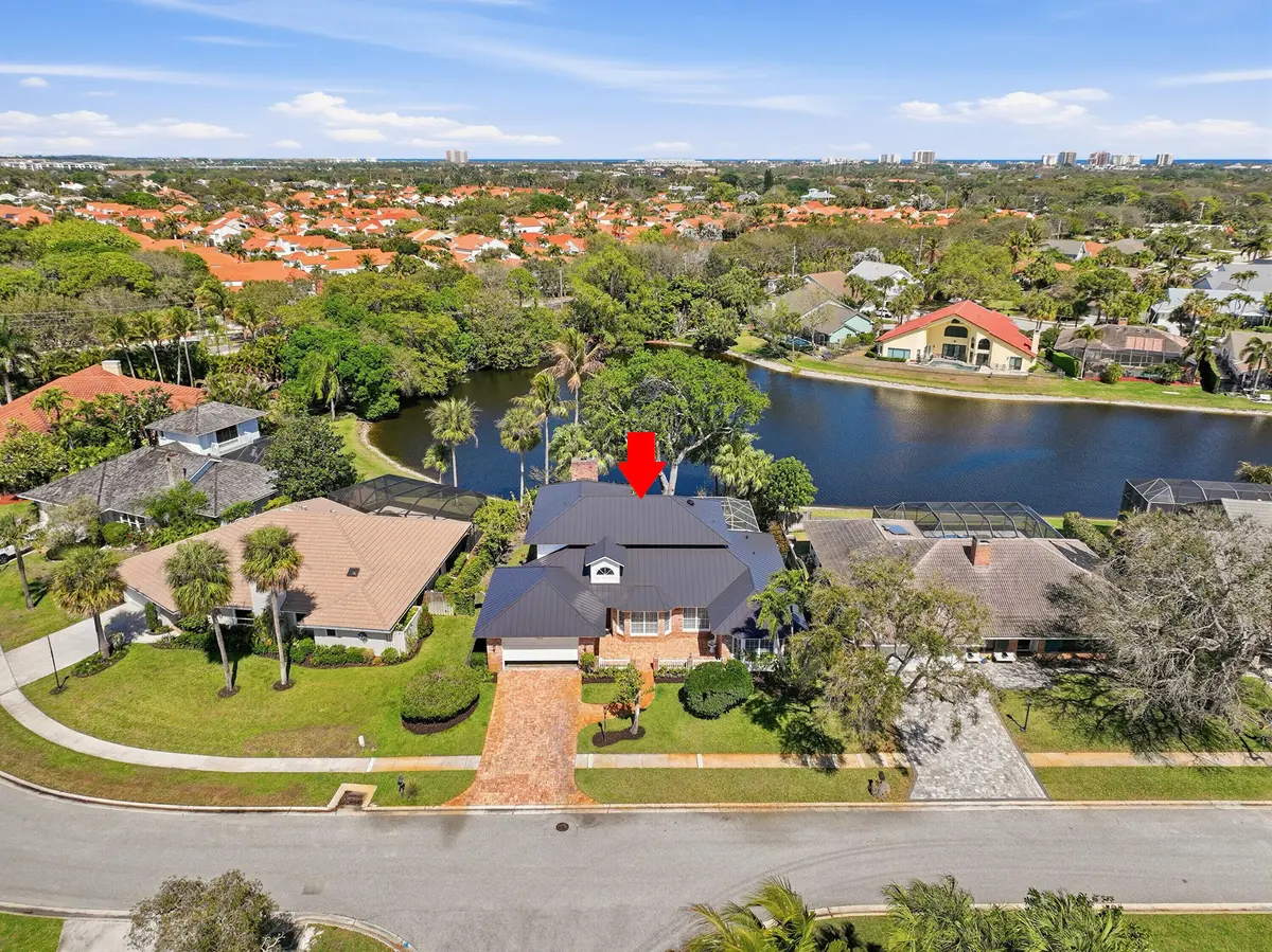 BACKS TO LAKE at 12886 LA ROCHELLE Circle, Palm Beach Gardens