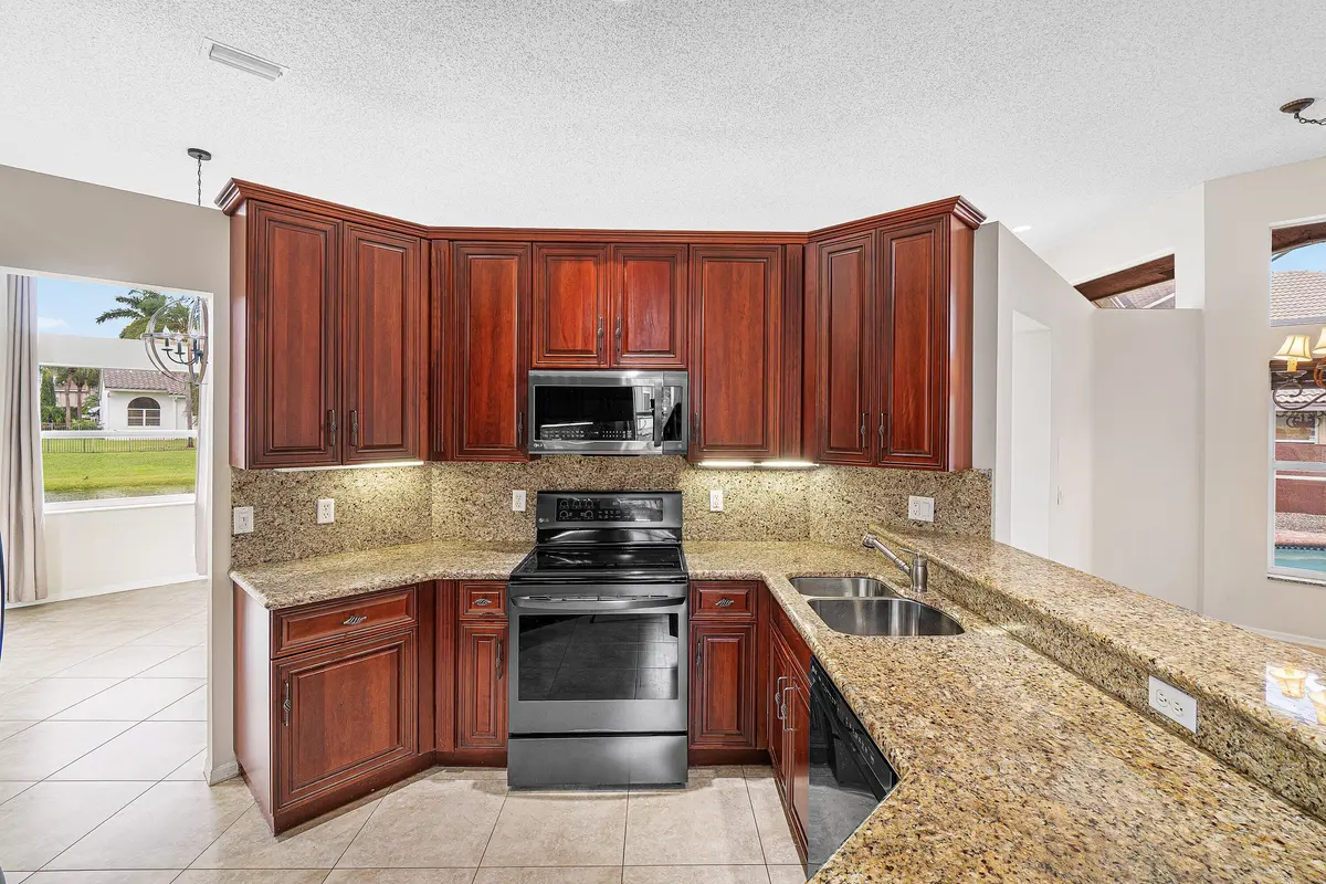 chef's kitchen at 10599 Saint Thomas Drive, Boca Raton
