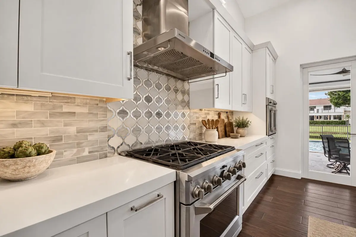 Refined Kitchen with Warm Neutral Stylin at 5757 HARRINGTON Way, Boca Raton