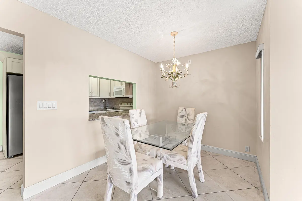 Dining Room at 805 Sky Pine Way F2, Greenacres
