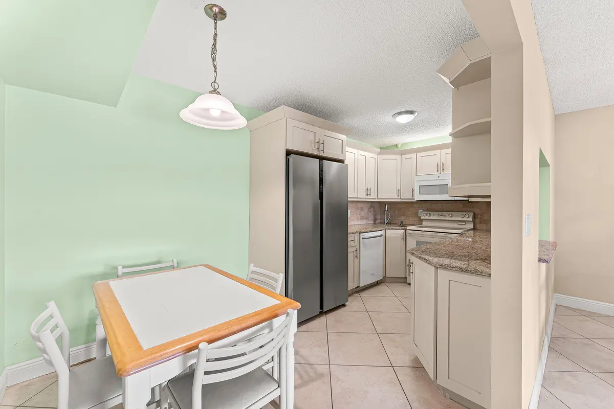 Eat-in Kitchen at 805 Sky Pine Way F2, Greenacres