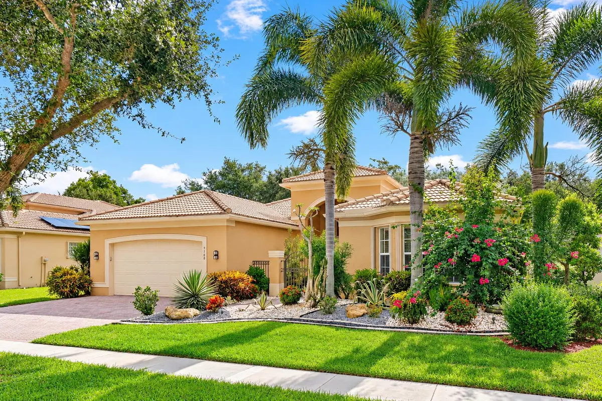 Sunlit Mediterranean Home and Tropical L at 7168 Corning Circle, Boynton Beach