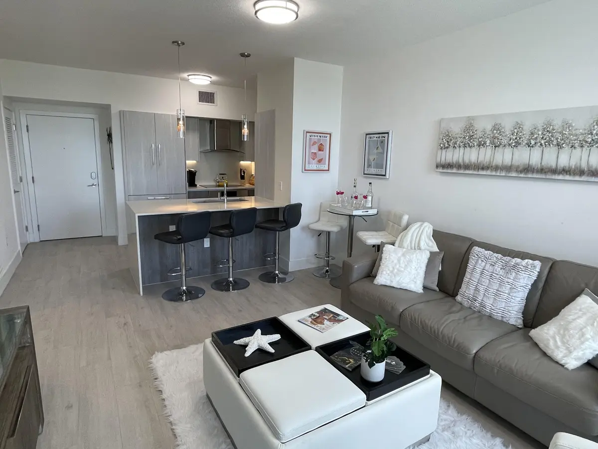 Living room to kitchen at 111 SE 1st Avenue Unit 502, Delray Beach