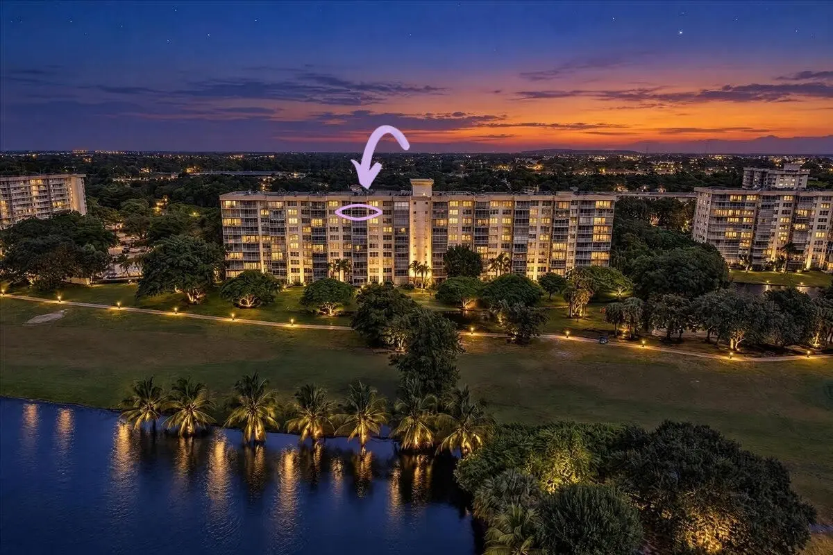 Unit twilight back of building at 3520 Oaks Way 904, Pompano Beach