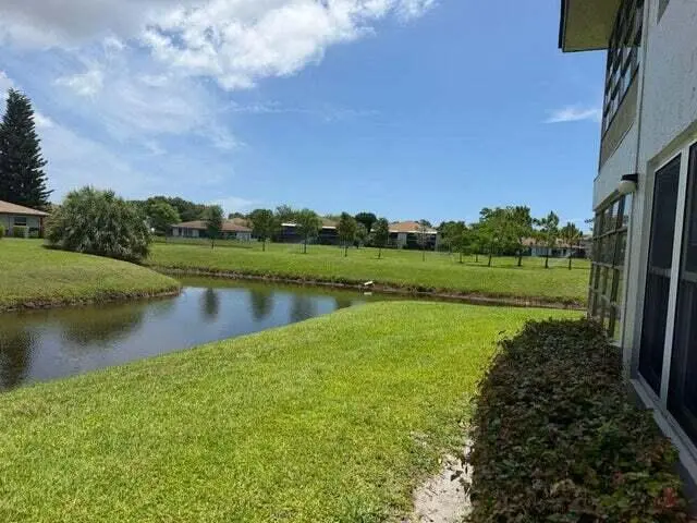 Rear View 3 at 13283 PINEAPPLE PALM Court B, Delray Beach