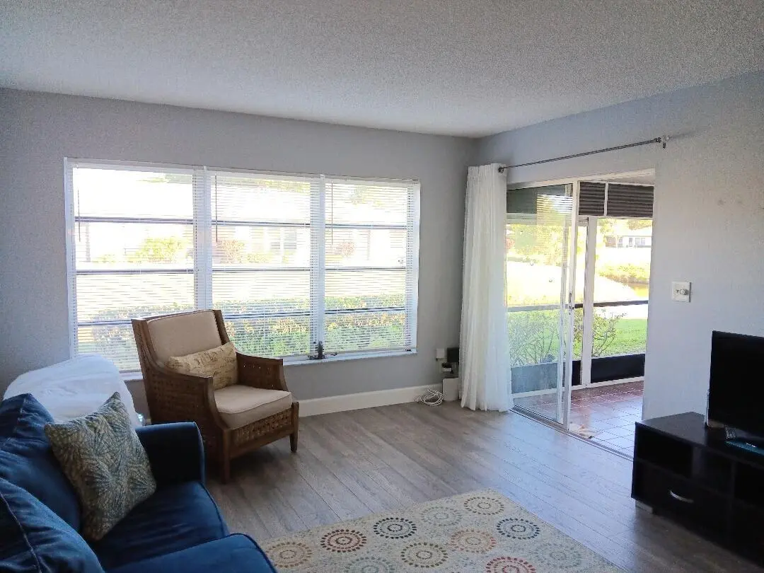 LR to Patio at 13283 PINEAPPLE PALM Court B, Delray Beach