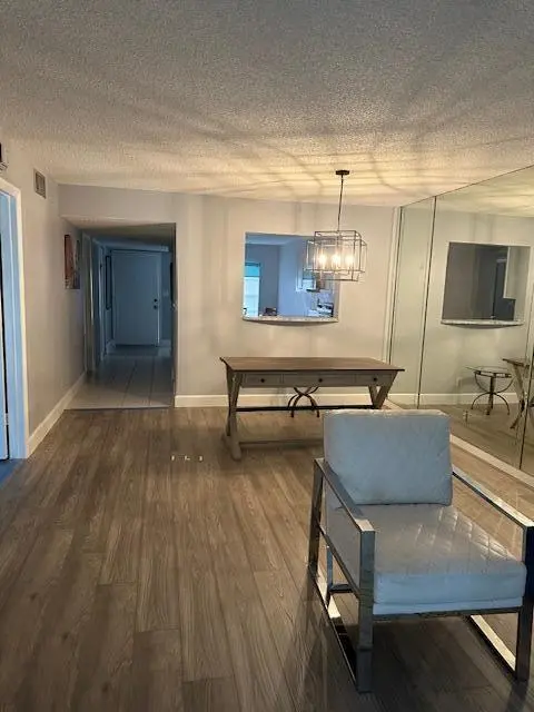 Dining area new floors at 13283 PINEAPPLE PALM Court B, Delray Beach