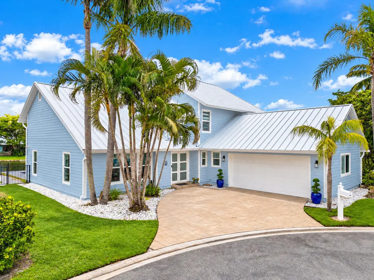 Blissful Blue Coastal Home at 9029 SE Breeze Way, Hobe Sound