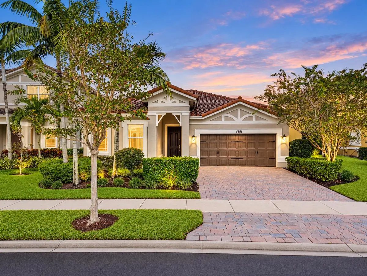 Twilight Mediterranean Home Exterior at 8561 LAKESIDE Bend, Parkland