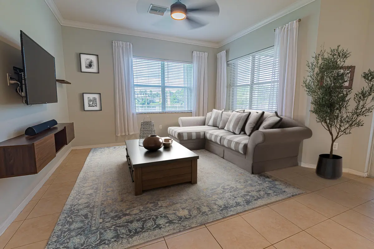 virtually staged - family rm at 625 SW Long Key Court, Port St. Lucie