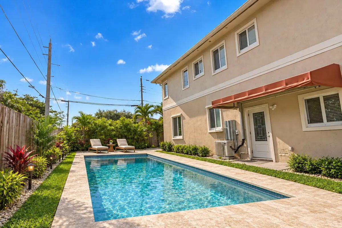 Virtually added pool at 4500 SW 25TH Terrace, Dania Beach