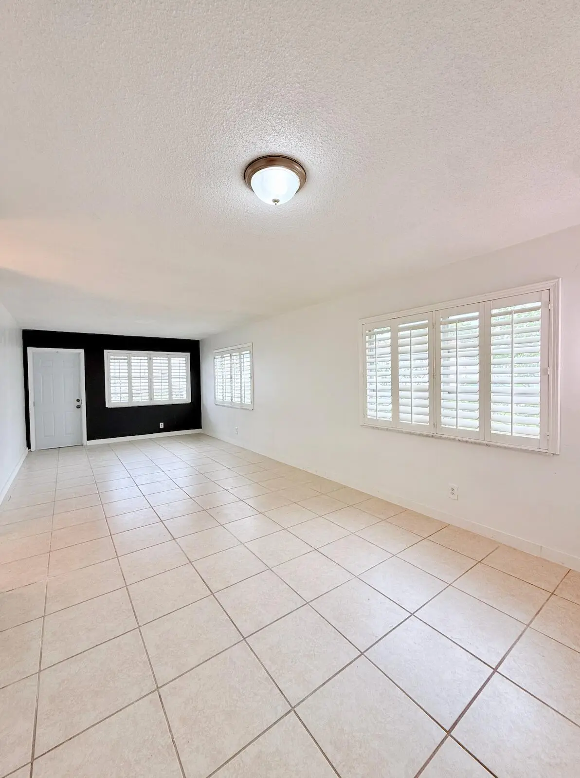 Living Room at 1280 NW 43rd Terrace 107, Lauderhill
